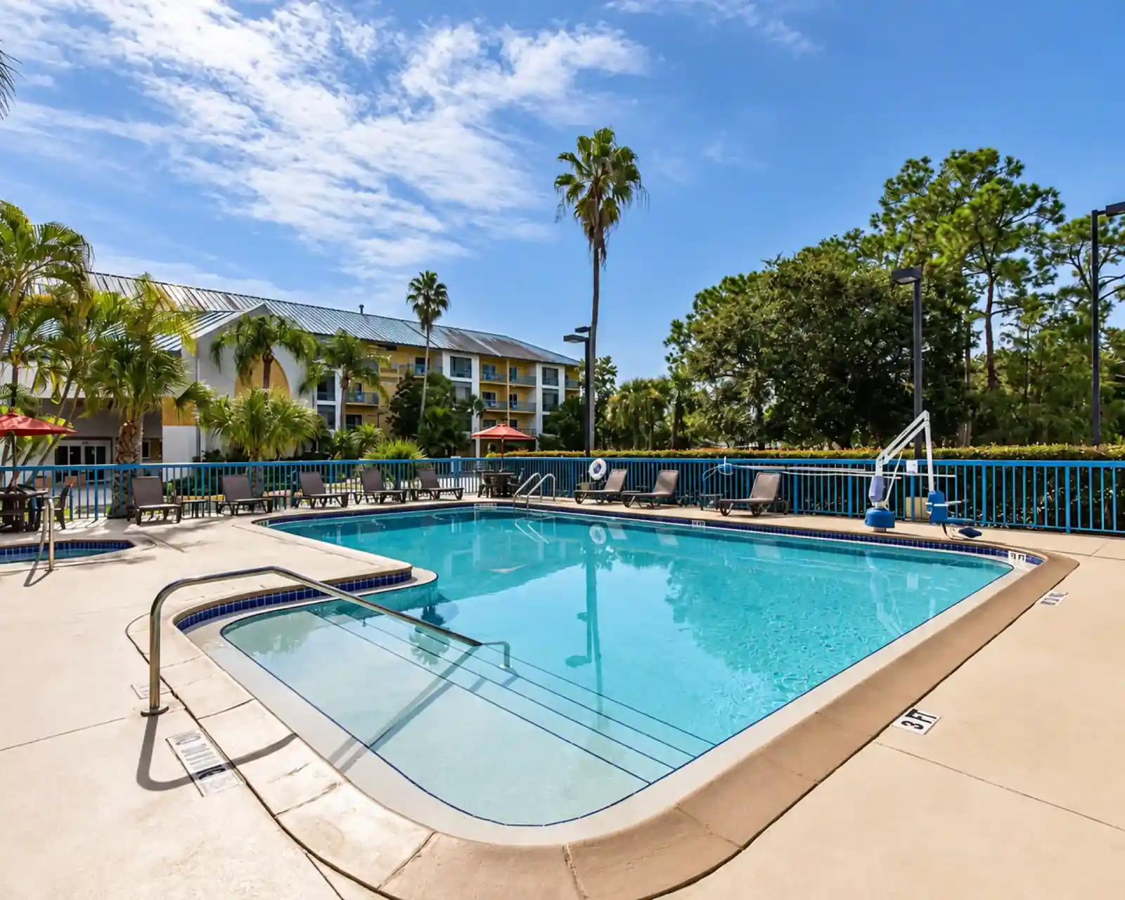 Outdoor heated pool and hotel grounds